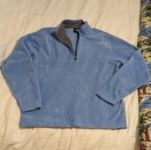 LIGHT blue foot locker half zip pull over size Large